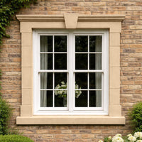 Abbey 26 Windowsill Paint colour inspiration on an exterior window surround against yellow brick with a soft creamy buff finish and gentle warm yellow undertones