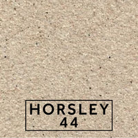 Horsley 44 textured stone effect paint close-up showing a balanced beige-grey stone finish with warm, refined undertones