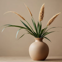 Ashridge 08 stone effect paint applied to a decorative vase with a warm earthy beige brown natural stone finish