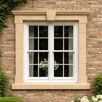 Rich Buff 17 Windowsill Paint colour inspiration on an exterior window surround against yellow brick with a warm rich buff Yorkstone finish