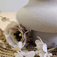 Alnwick 16 stone effect paint applied to a decorative vase showing a soft pale Portland stone finish