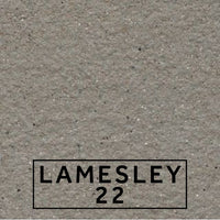 Lamesley 22 textured stone effect paint close-up showing a soft warm grey finish with subtle beige undertones and mineral flecking