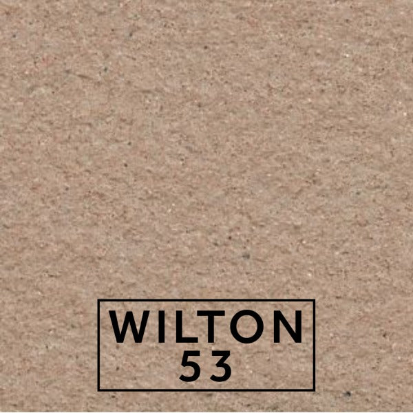 Wilton 53 textured stone effect paint close-up showing a rich warm beige Purbeck limestone finish