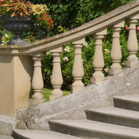 A balustrade painted with Stonelux Garden Paint in Rich Buff Sandstone, giving it a stone effect finish.